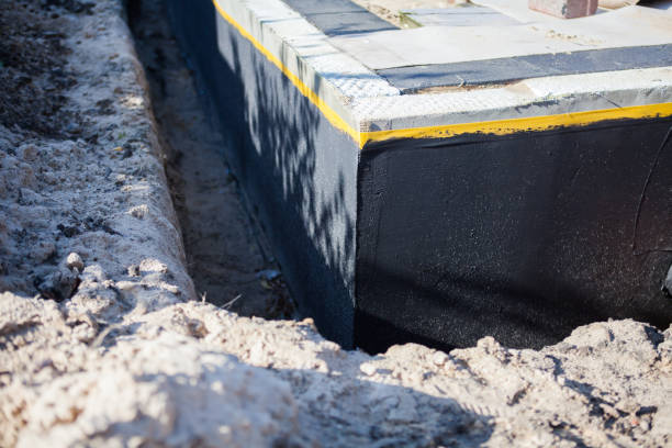Professional Waterproofing technician working in Rising Sun, IN